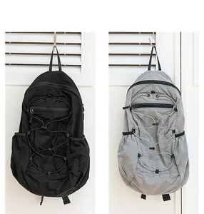 Japanese leisure nylon backpacks shown in black and grey grid patterns for comparison.