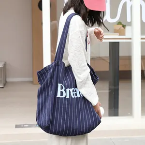 Casual navy blue striped canvas tote bag with white letter print for women's daily use