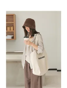 Lifestyle detail of a Japanese style linen tote bag with letter print Salome