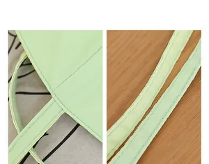 Primer plano de las costuras reforzadas y la textura de nailon de un bolso verde