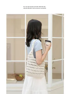 Handmade crochet cotton woven armpit bag with stylish hollow-out pattern and cord