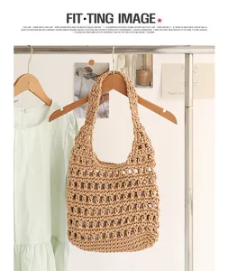 Detailed shot of a beige handwoven cotton thread hollow shoulder bag with inner pouch