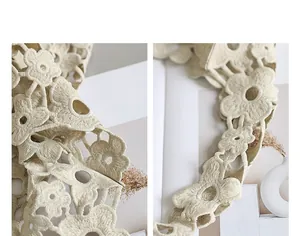 Close-up detail of cream lace floral pattern on aesthetic hollow shoulder bag strap