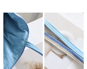 Macro view of blue nylon lining and striped woven handles on a stylish tote bag