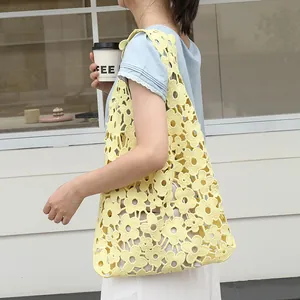 Fashionable yellow floral lace hollow-out shoulder bag with drawstring inner pouch