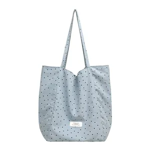 Japanese style casual light blue polka dot nylon tote bag with decorative white patch label
