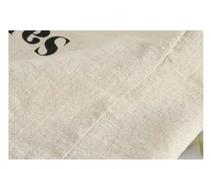 Detailed macro view of high-quality natural linen fabric texture on a tote bag
