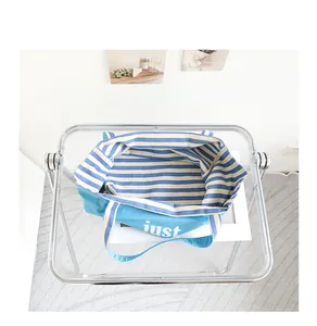 Top-down detailed view of blue striped canvas tote bag showing the spacious interior design