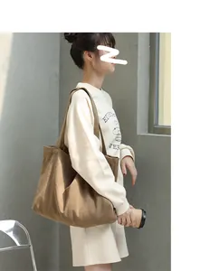 Detail shot of a minimalist brown canvas tote bag for casual everyday Japanese style