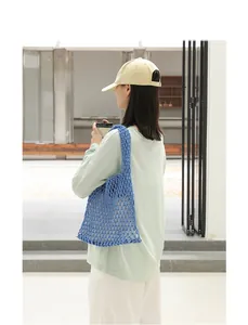 Casual blue cotton woven mesh underarm bag with hollow design for women