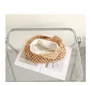 High-quality detailed view of woven cotton mesh bag with drawstring inner pouch
