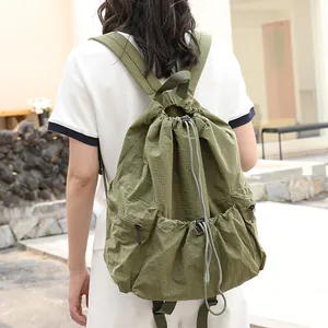 Casual green checkered nylon drawstring backpack with large capacity for travel and school