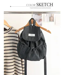 Mochila retro de lona denim con cordón y bolsillos laterales plisados