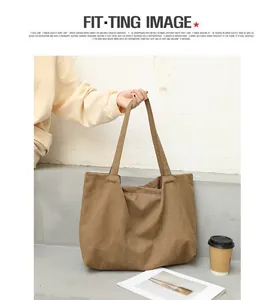 Detail view of retro Japanese style solid brown canvas tote bag for stylish women