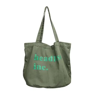 Bolso tote de lona verde oliva lavado vintage con estampado de letras headless inc.