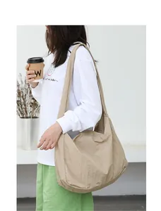 Casual khaki nylon shoulder bag for women with minimalist solid color design
