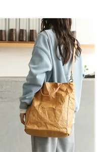 Detailed view of a Japanese retro tote bag made of brown washed kraft paper material