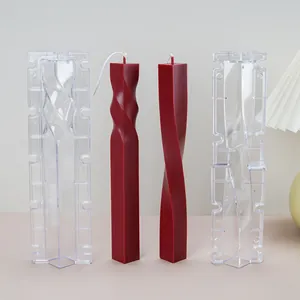 Detailed view of two-piece square spiral twisted pillar candle molds and finished candles