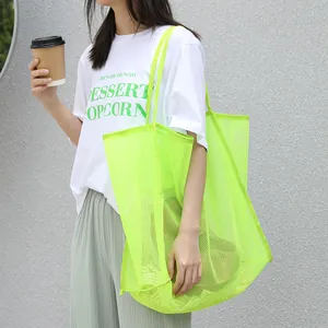 Bolso tote de malla verde neón para mujer, elegante bolso de hombro hueco para compras.