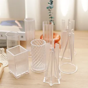 Collection of geometric pleated acrylic candle molds for DIY table lamp aromatherapy