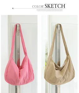 Detailed view of casual nylon hobo crossbody bags in vibrant pink and neutral khaki colors