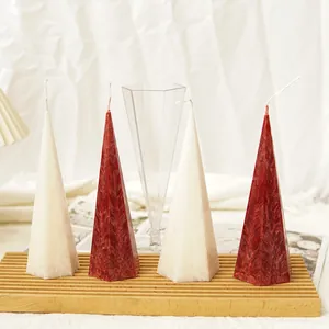 Handmade textured hexagonal cone candles in red and white with DIY acrylic mold set