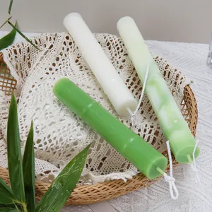 Macro view of bamboo-shaped scented candles showing unique node textures and colors