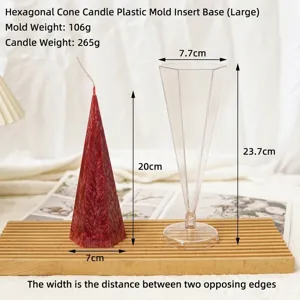 Detailed dimensions of hexagonal pyramid candle mold with finished red wax candle