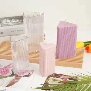 Detailed macro view of triangular ribbed plastic candle molds with elegant vertical stripes