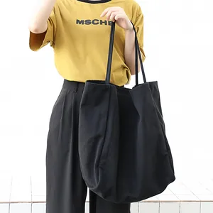 Large capacity washed black canvas tote bag for casual everyday use and minimalist style