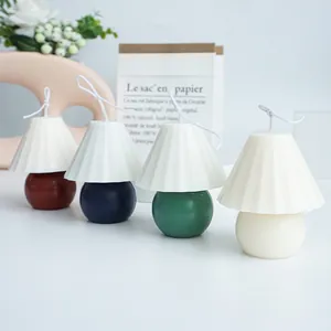 Elegant pleated lamp shaped scented candles in multiple colors for stylish home decor