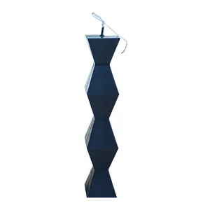 Handcrafted modern dark grey geometric pillar candle featuring a unique zig-zag endless shape
