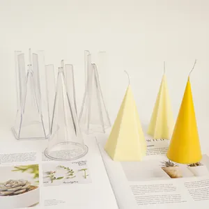 High-quality transparent geometric PC candle molds with finished star and cone candles