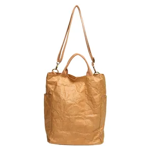 Retro washed kraft paper tote bag featuring wrinkled texture and adjustable strap