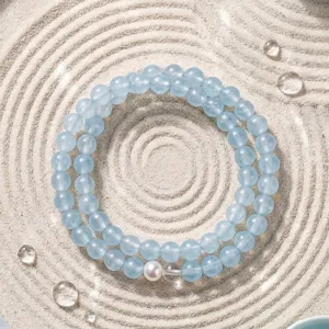 Double-layered blue chalcedony beaded bracelet for women featuring a single white pearl