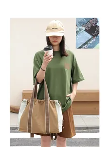 Bolso tote de lona casual con cordón y paneles de nailon en contraste, multifuncional