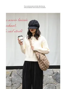 Detailed view of stylish quilted brown crossbody bag for women in casual street style