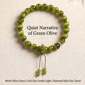 Elegant olive green cat eye beaded bracelet with Zen style tassel and silver accents