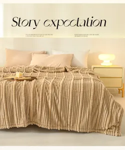 Detailed view of the soft flannel blanket with a thick vertical striped texture for home