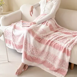 Cozy pink and white striped flannel fleece blanket for sofa and office home decor