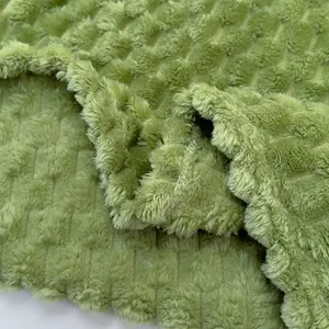 Ultraweiche grüne Flanell-Fleecedecke mit strukturiertem Waffelmuster in Nahaufnahme