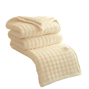 Soft cream milk velvet fleece blanket with waffle texture for cozy office napping