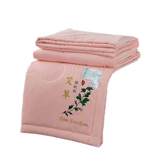 Lightweight pink summer cool quilt featuring mugwort herbal mosquito repellent embroidery