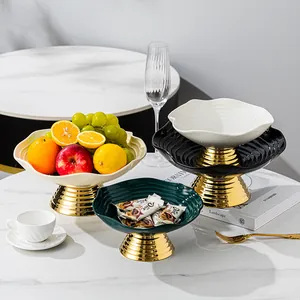 Luxury ceramic pedestal fruit bowl with gold base for modern living room decor