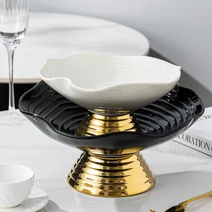 Modern ceramic fruit plate set with elegant gold pedestal base for luxury home decor