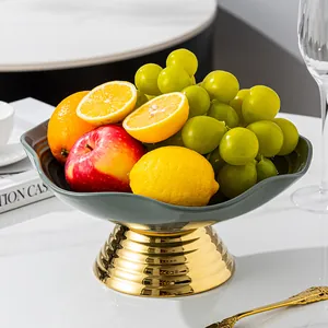 Luxury modern ceramic high-footed fruit bowl with ribbed golden base for home decor