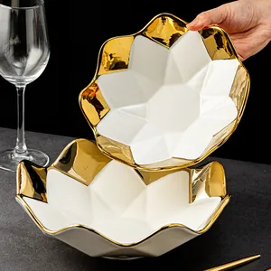 Luxury geometric ceramic fruit bowl with elegant gold rim and white finish