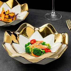 Elegant lotus-shaped ceramic fruit bowl with luxury gold rim and premium white porcelain finish