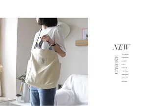 Lifestyle view of a minimalist beige canvas tote bag with large capacity