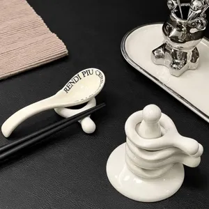 Set of creative ceramic chopstick and spoon rests in minimalist white design
